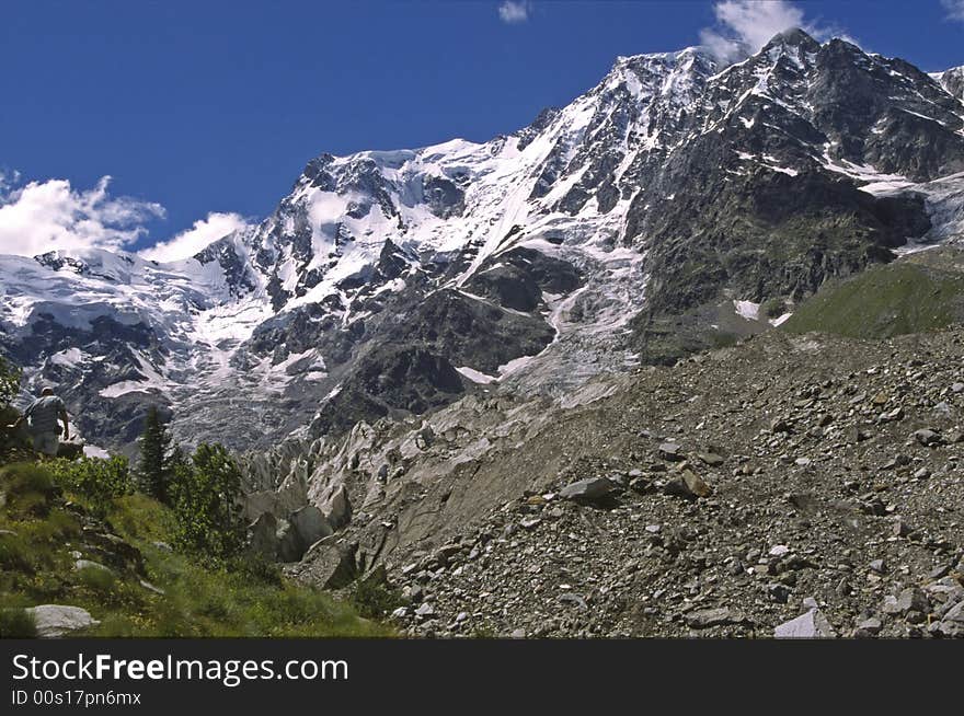 View on gletcher in Italy, snow on mountains and blue sky. View on gletcher in Italy, snow on mountains and blue sky