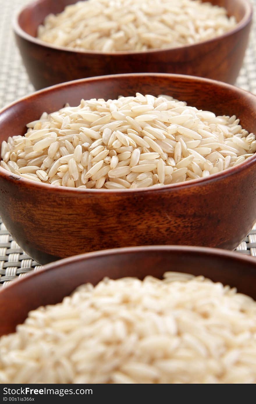 Several bowls of healthy organic basmati rice. Several bowls of healthy organic basmati rice.