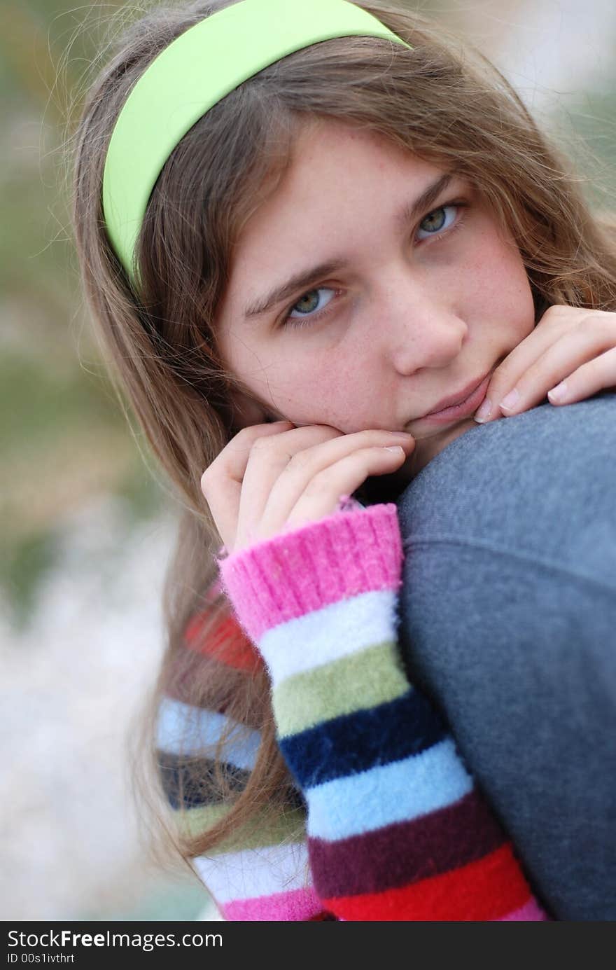 Young and happy girl is enjoying herself outdoors. Young and happy girl is enjoying herself outdoors