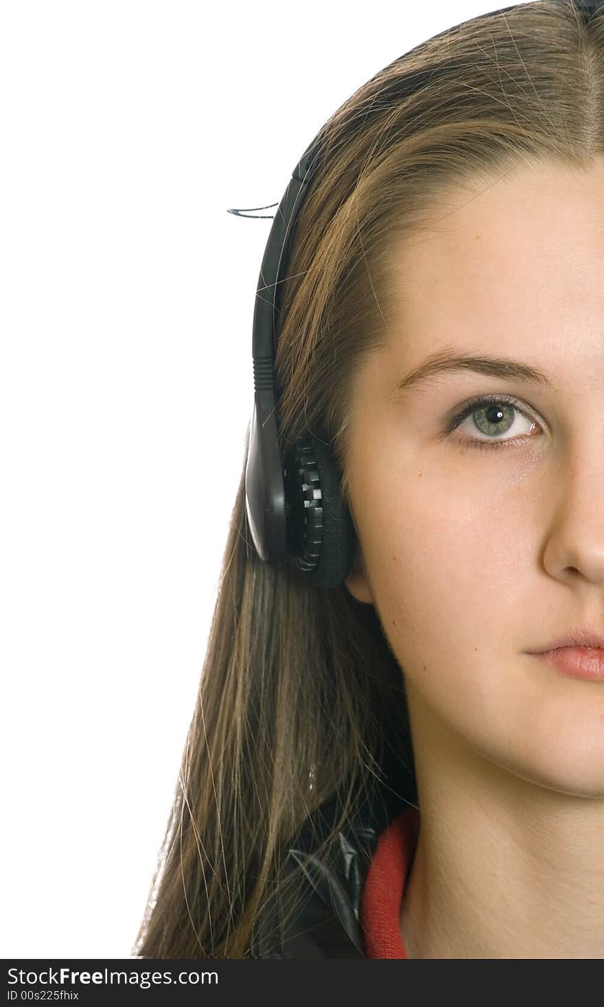 Young  girl in  headphone  on the white background. Young  girl in  headphone  on the white background