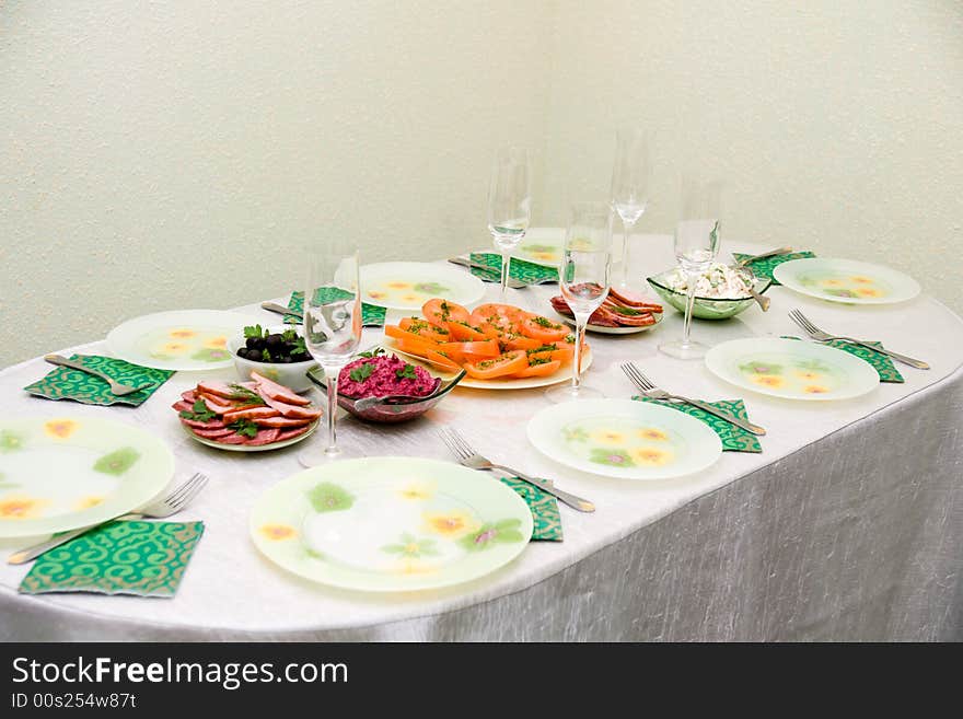 Festive dining table and much tasty meal. Festive dining table and much tasty meal