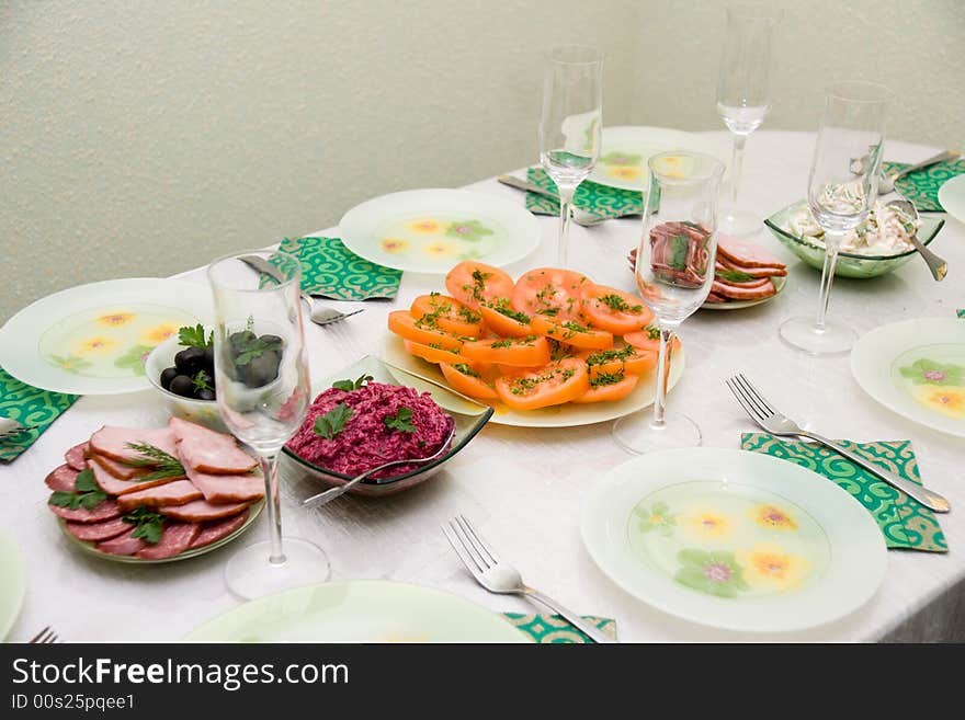 Festive dining table and much tasty meal. Festive dining table and much tasty meal