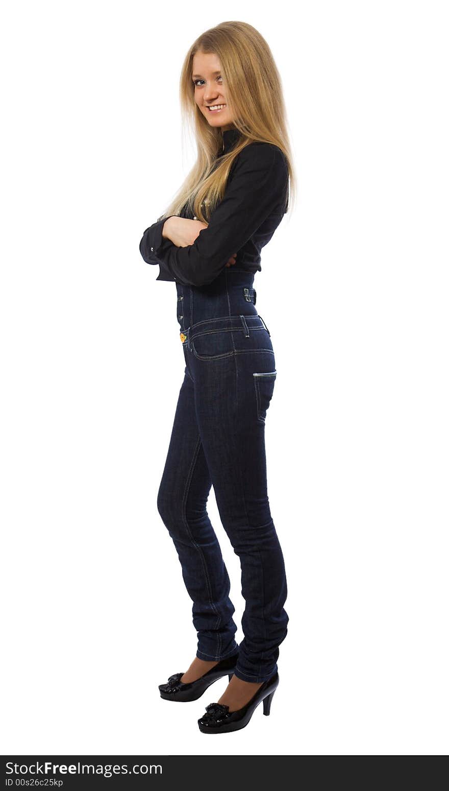 Beauty girl dressed in dark blue jeans isolated on white