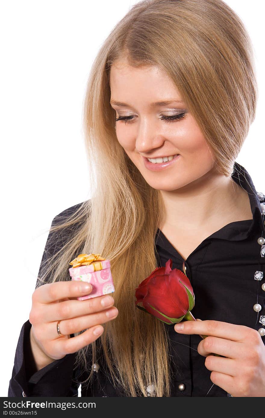 Pretty smiling girl hold red rose and gift isolate on white. Pretty smiling girl hold red rose and gift isolate on white