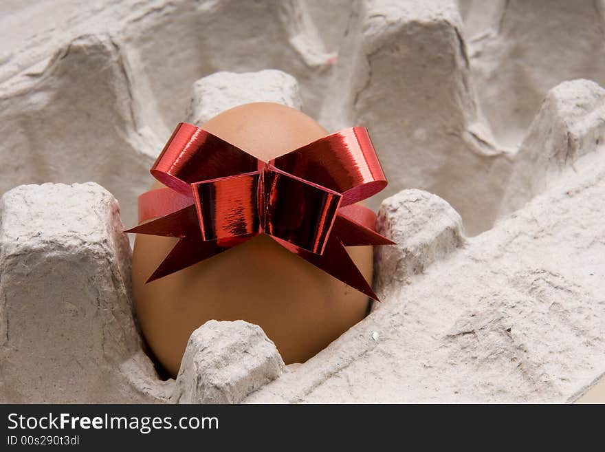 Egg  with red bow