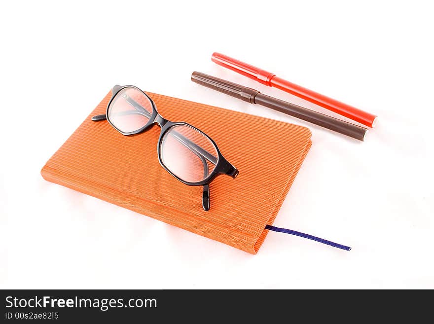 Red book, black glasses and markers1