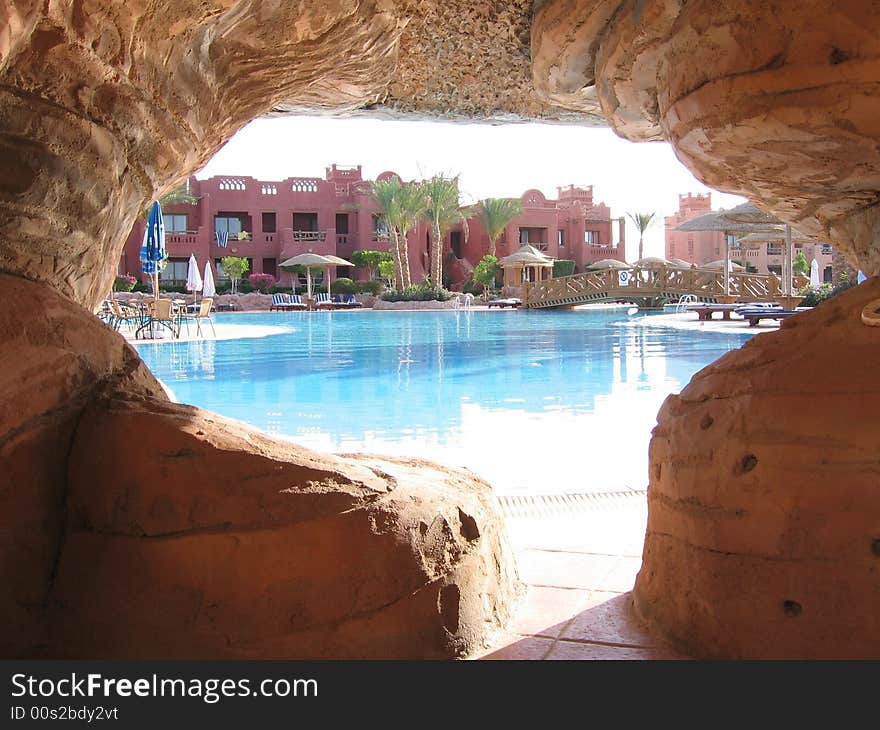 An hole in an artificial mountain in red sea, with a nice view of the resort. An hole in an artificial mountain in red sea, with a nice view of the resort