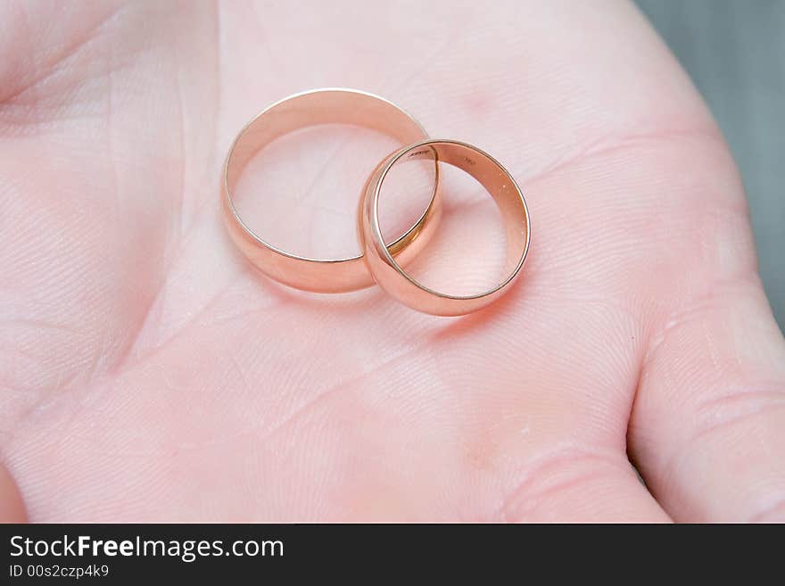 Wedding rings on palm