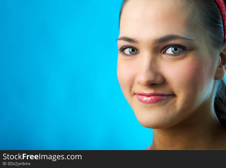 Beauty woman portrait on blue background