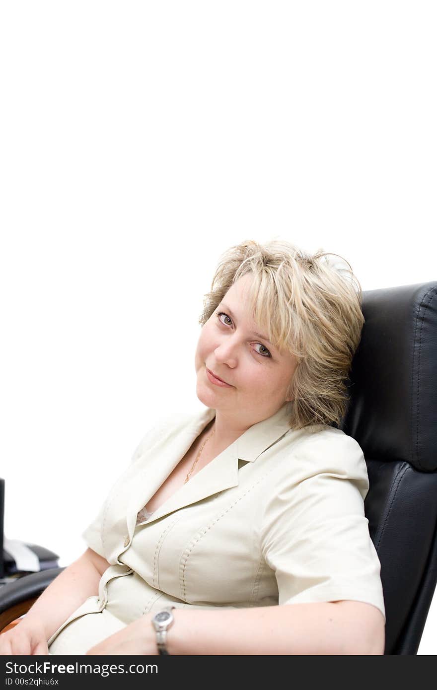 Mid-life business woman in chair