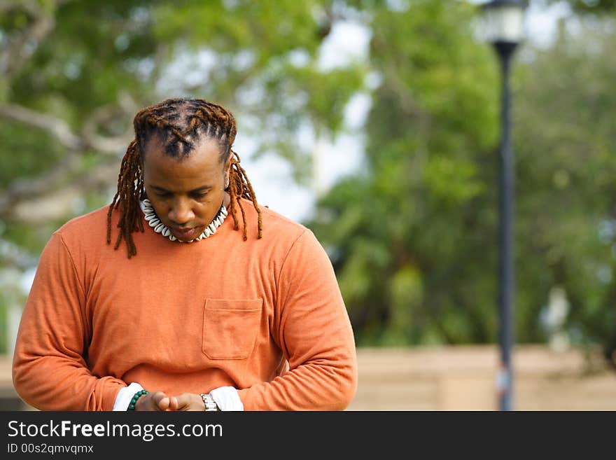 Man outreaching his hands. Blurry Background. Man outreaching his hands. Blurry Background.