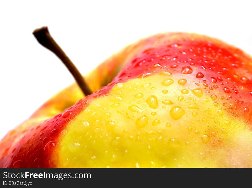 Part of a fresh wet apple on white background