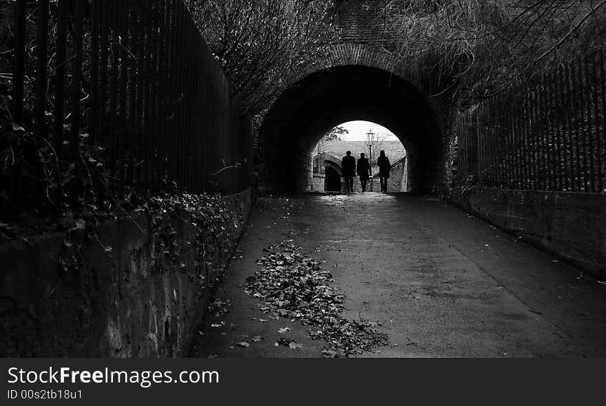 Three people in tunnel(Vysehrad Castle,Prague). Three people in tunnel(Vysehrad Castle,Prague)