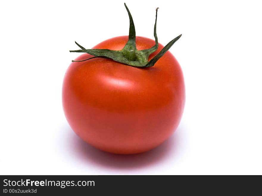 Juicy Isolated Tomato on the white background