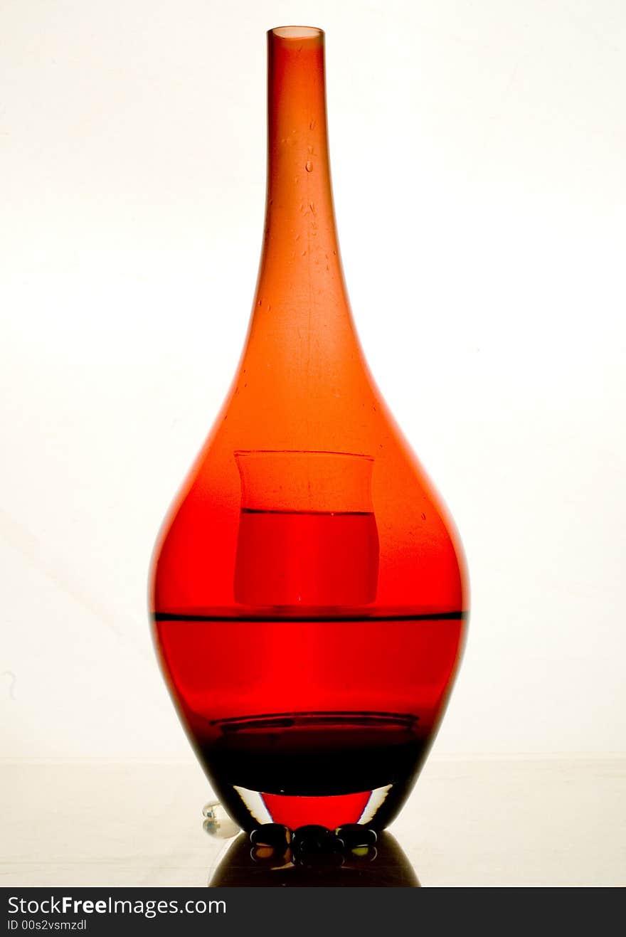 Rereflections in a red long bottle