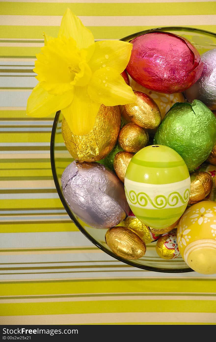 Easter eggs in bowl and flower. Easter eggs in bowl and flower