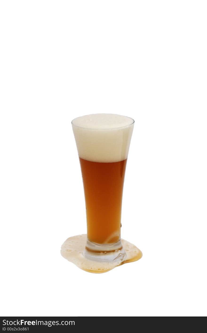 Glass of honey brewed wheat beer on white. Glass of honey brewed wheat beer on white