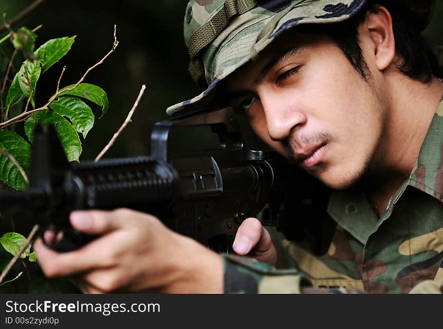 Soldier taking aim