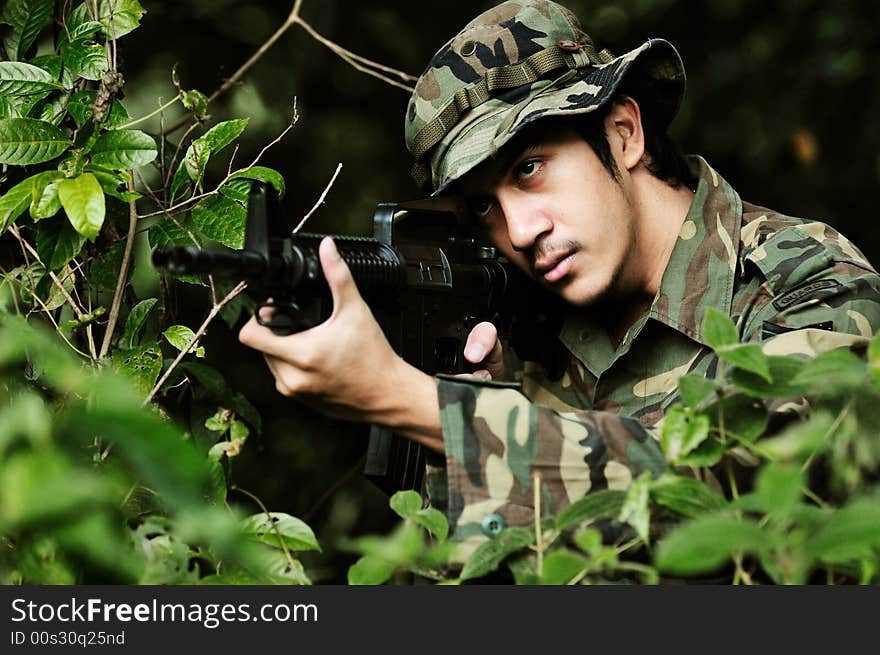 Soldier taking aim for shot