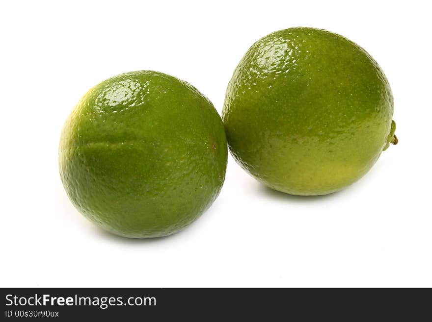 Healthy green lime fruit, isolated on white