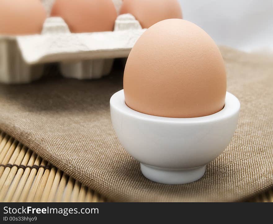 Close-up of an egg in a white eggcup