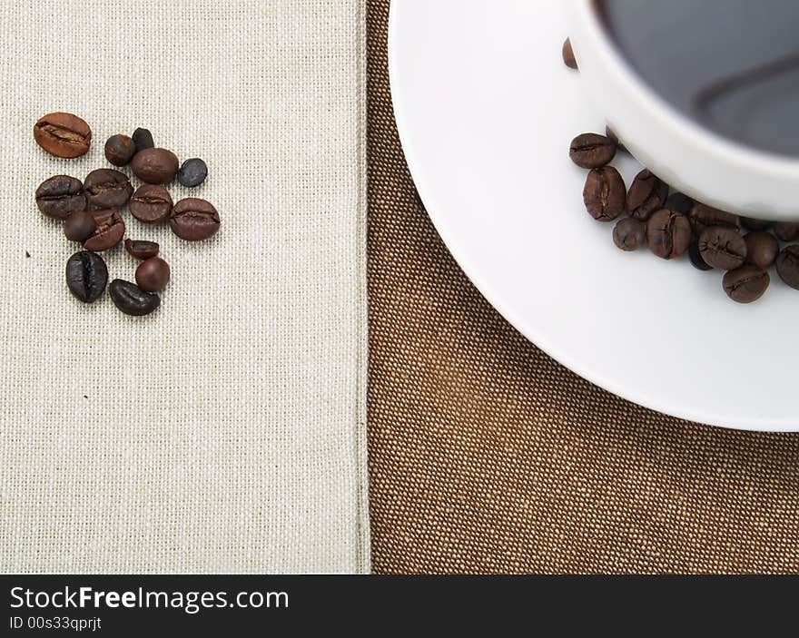 Coffee cup and coffee beans