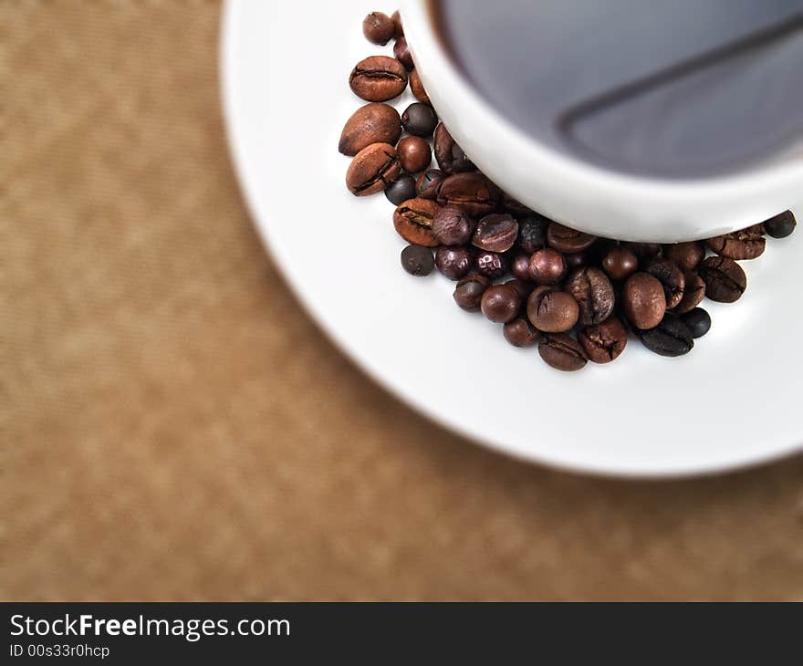 Coffee cup with beans