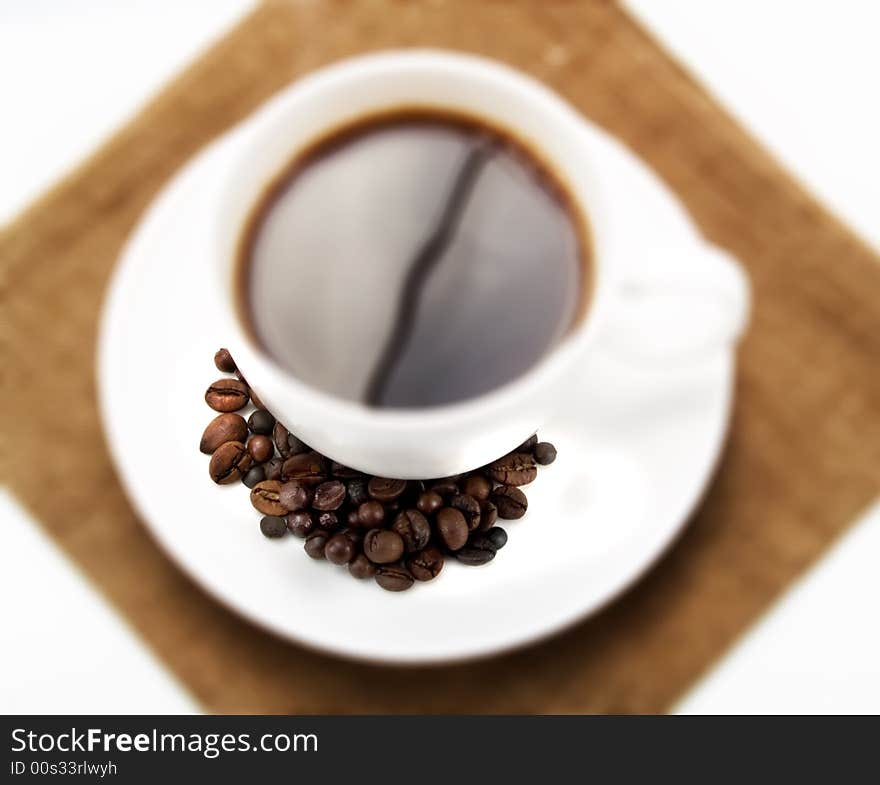 Coffee cup with beans