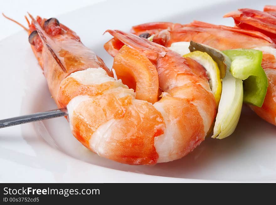 Large juicy boiled shrimps served on plate. Large juicy boiled shrimps served on plate