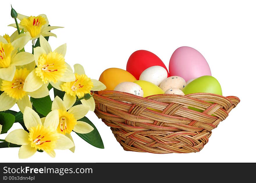 Easter basket and daffodil isolated on white background