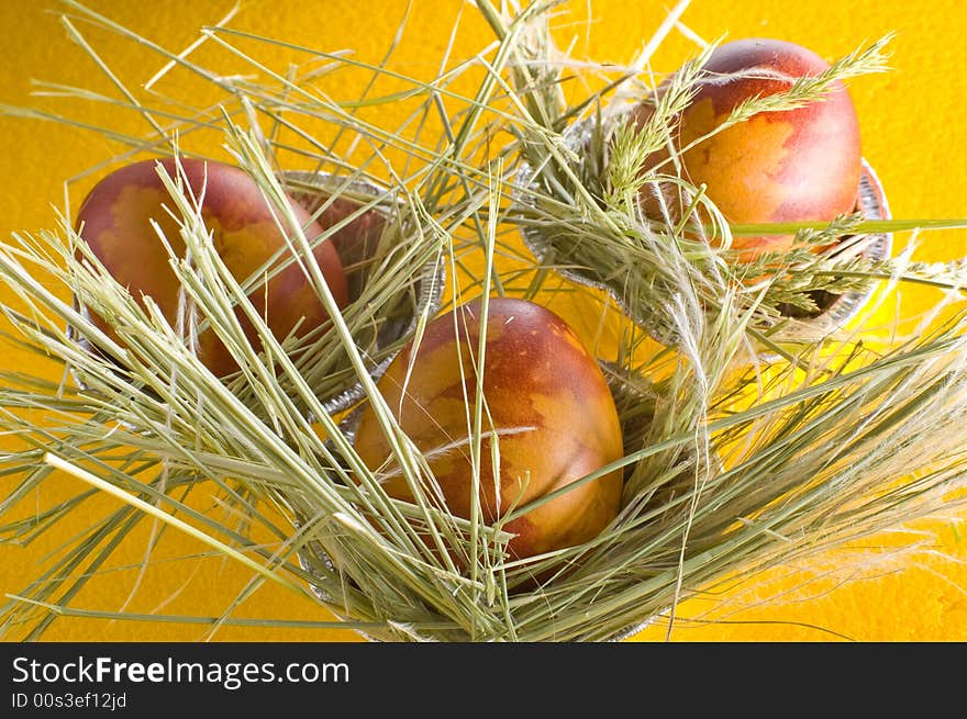 Easter eggs on yellow background