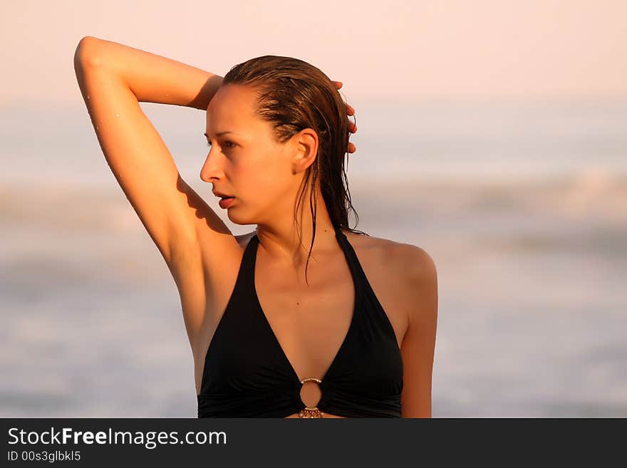 Woman posing at the beach