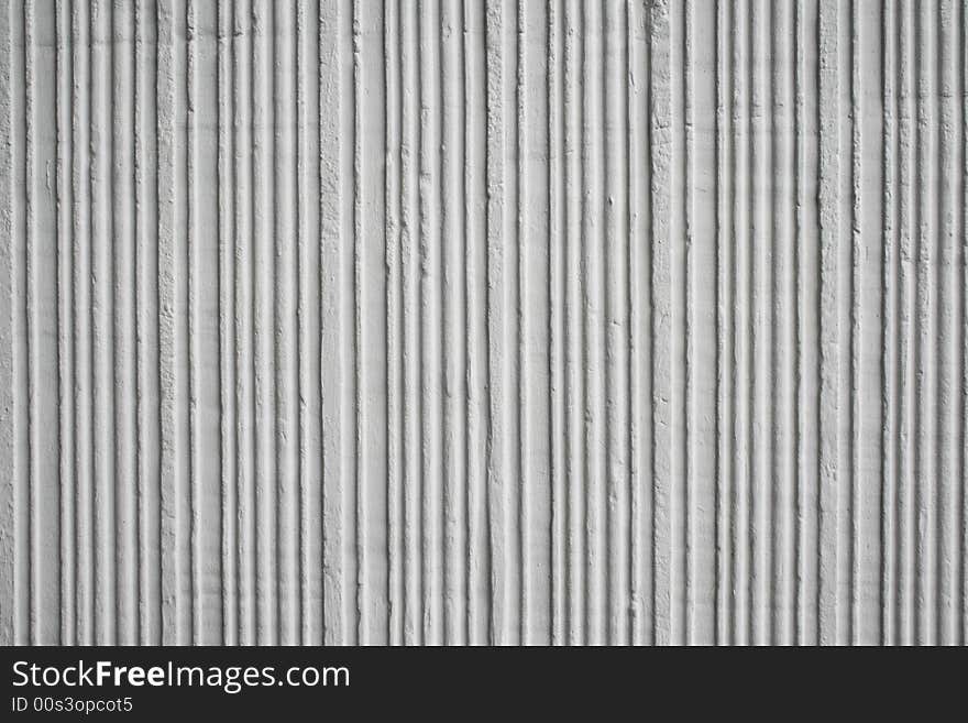 White, stone wall in a strip