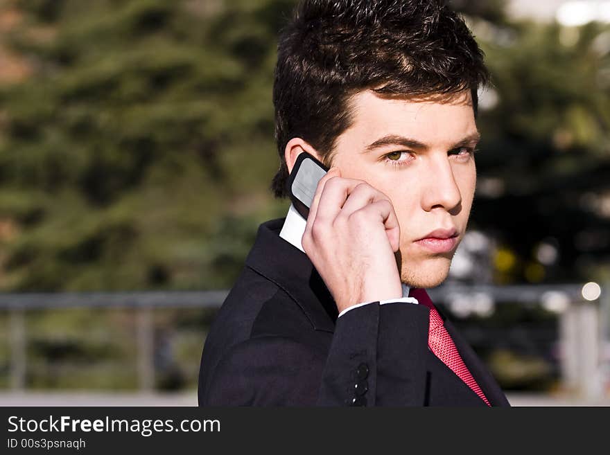 Businessman looking information at his phone. Businessman looking information at his phone