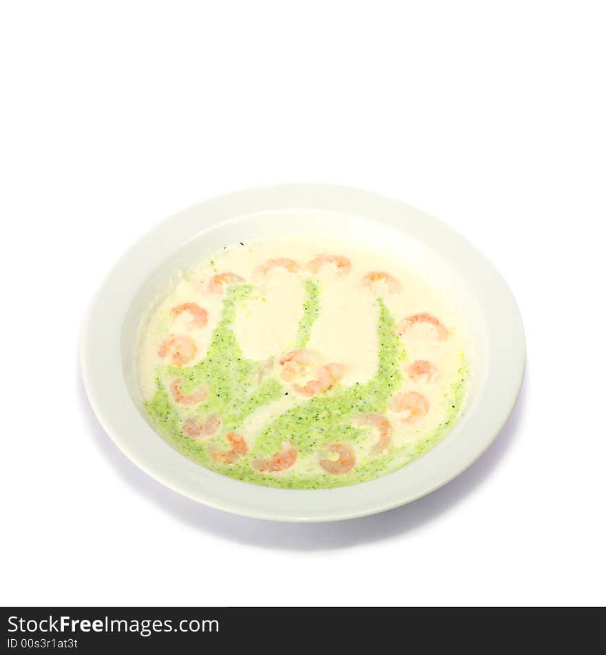 A plate of gourmet soup on white background