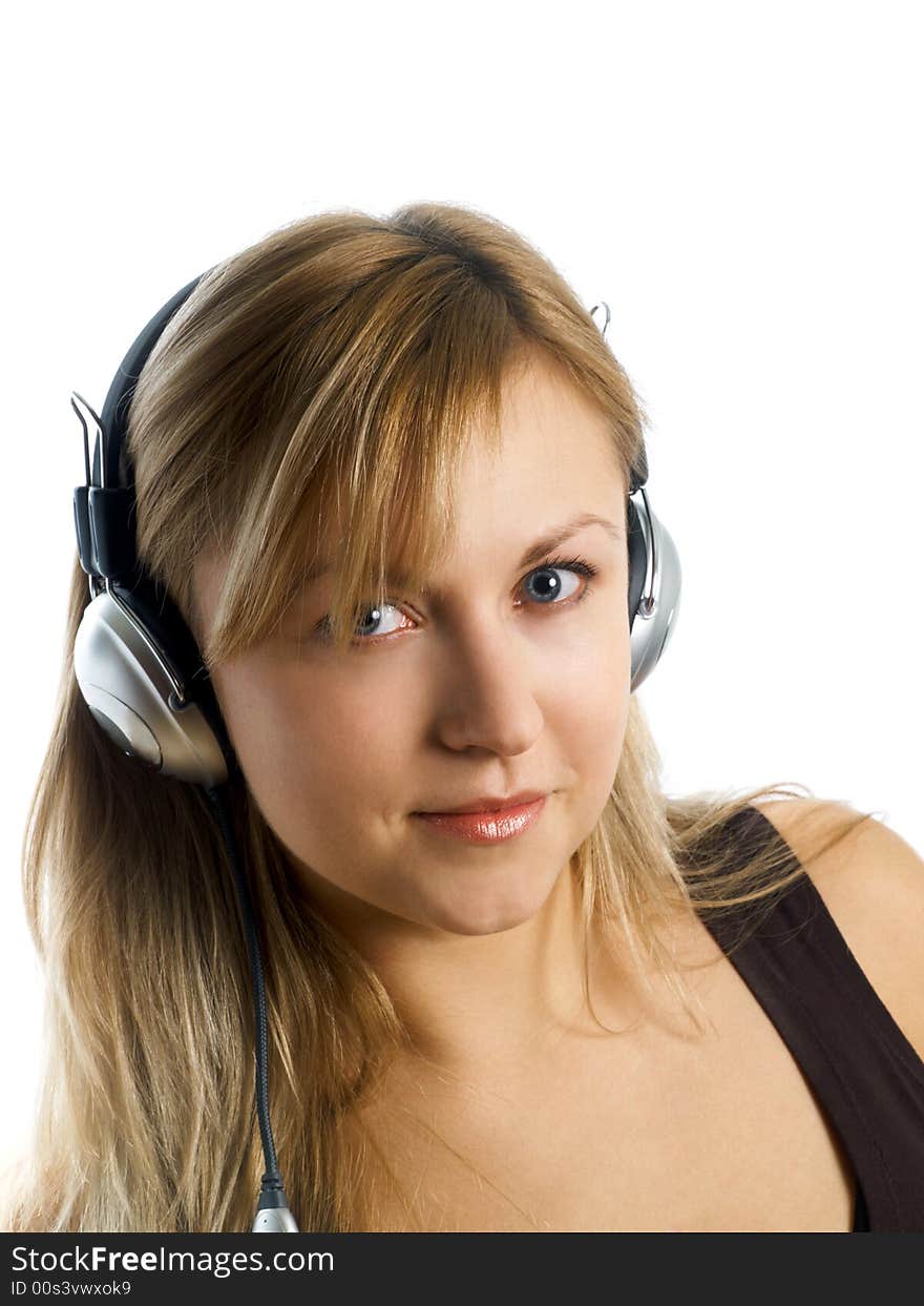 Blonde girl with headphones on white background