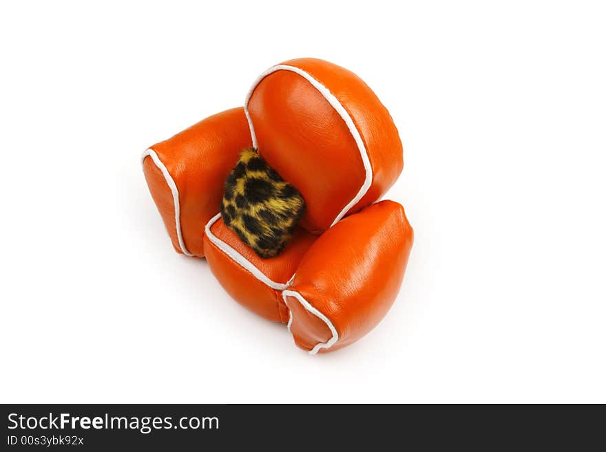 Orange chair on white, fur cushion