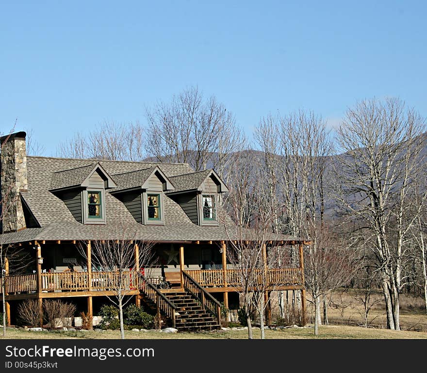 Home in the mountains with large deck.