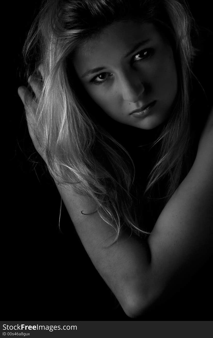 Beautiful woman portrait on a black background. Beautiful woman portrait on a black background