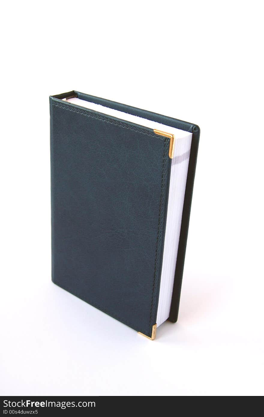 Blue material notebook isolated on white. Blue material notebook isolated on white.