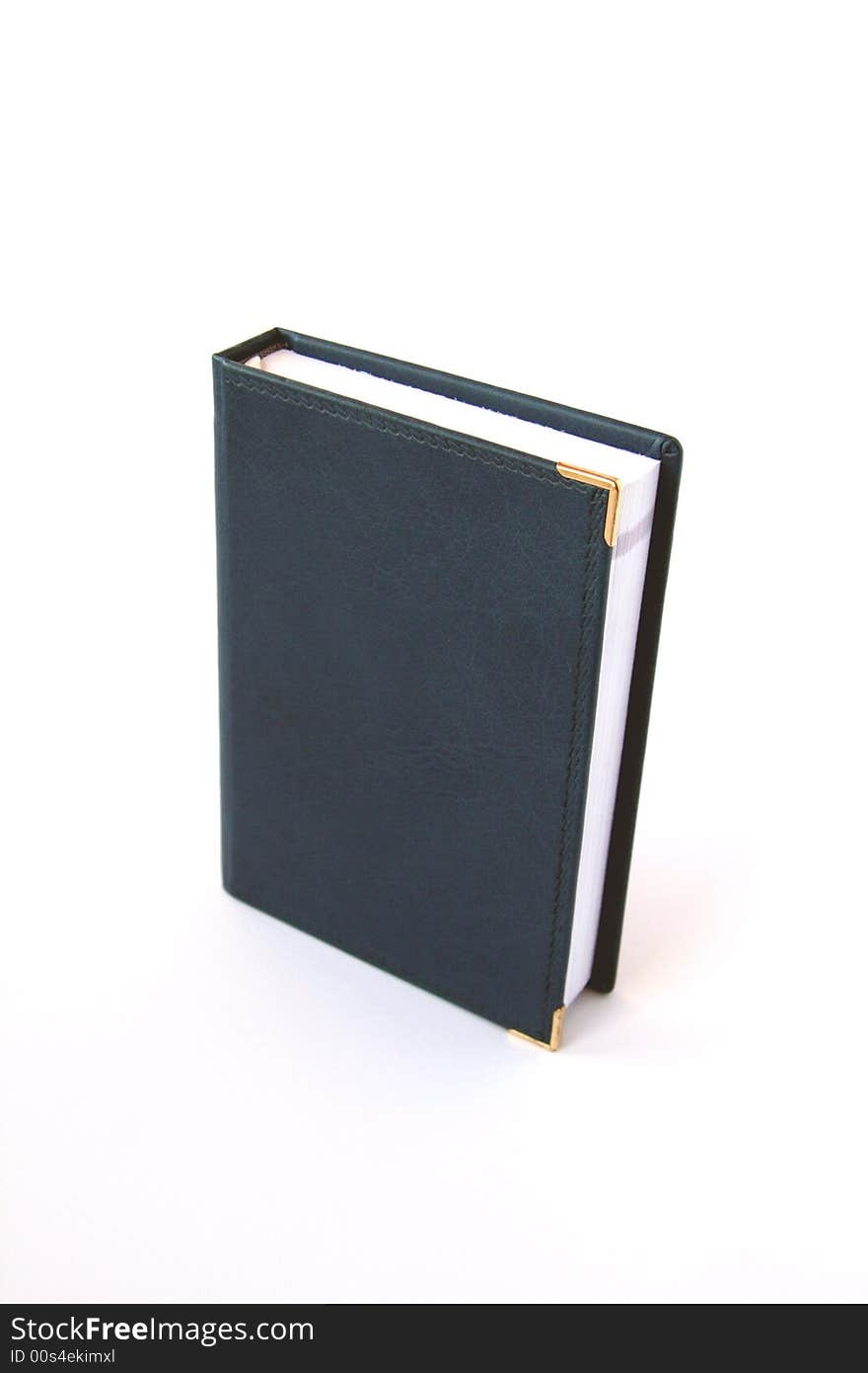 Blue material notebook isolated on white. Blue material notebook isolated on white.