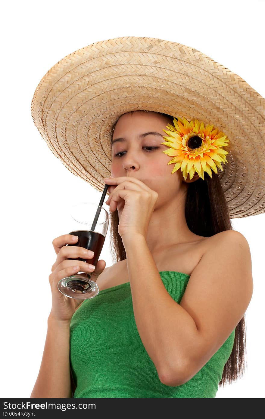 Girl on summer hat sipping a cold drink. Girl on summer hat sipping a cold drink