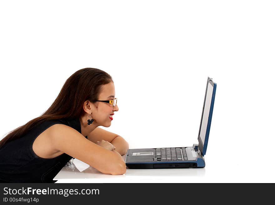 Young secretary smiling infront of her laptop