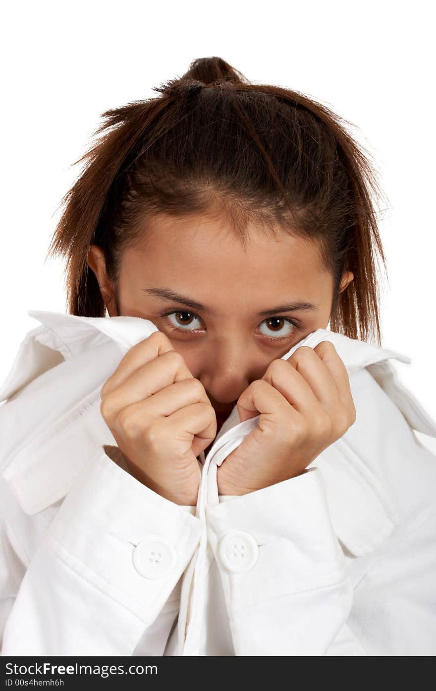 Young woman covering her face