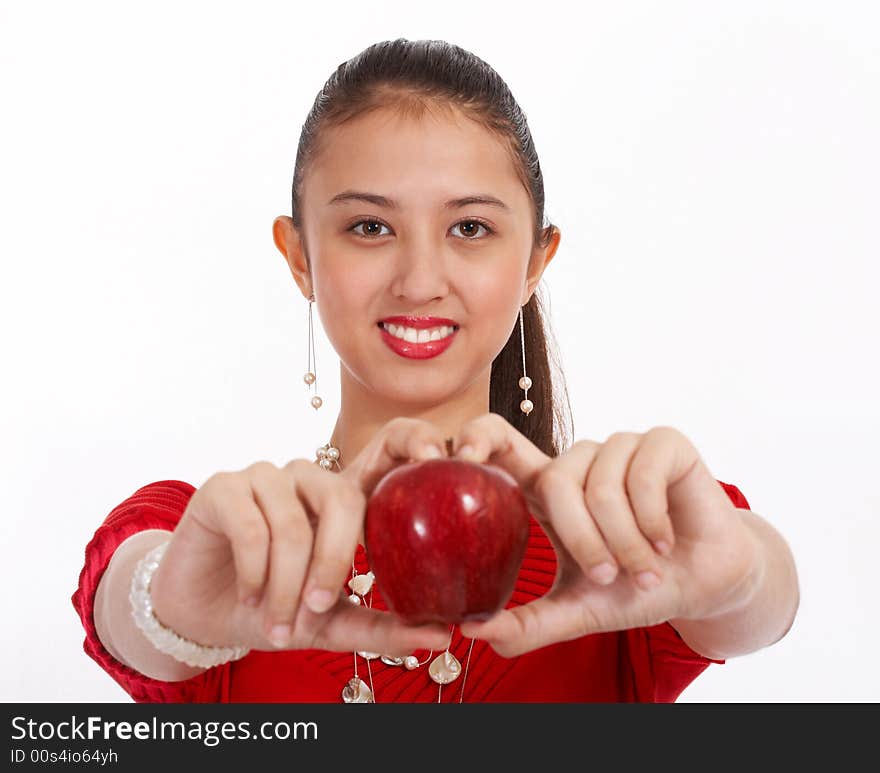 Woman holding red apple