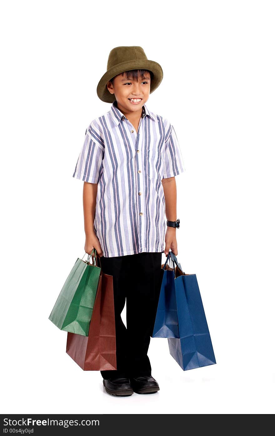 Happy young boy on a shopping spree