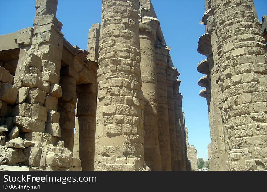 View on ruins of ancient pillars in Karnak temple. View on ruins of ancient pillars in Karnak temple