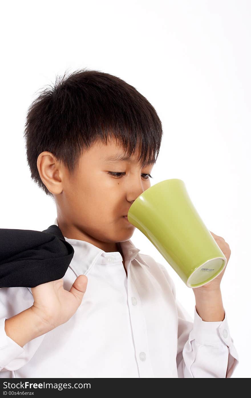 Young office boy is drinking on a white background