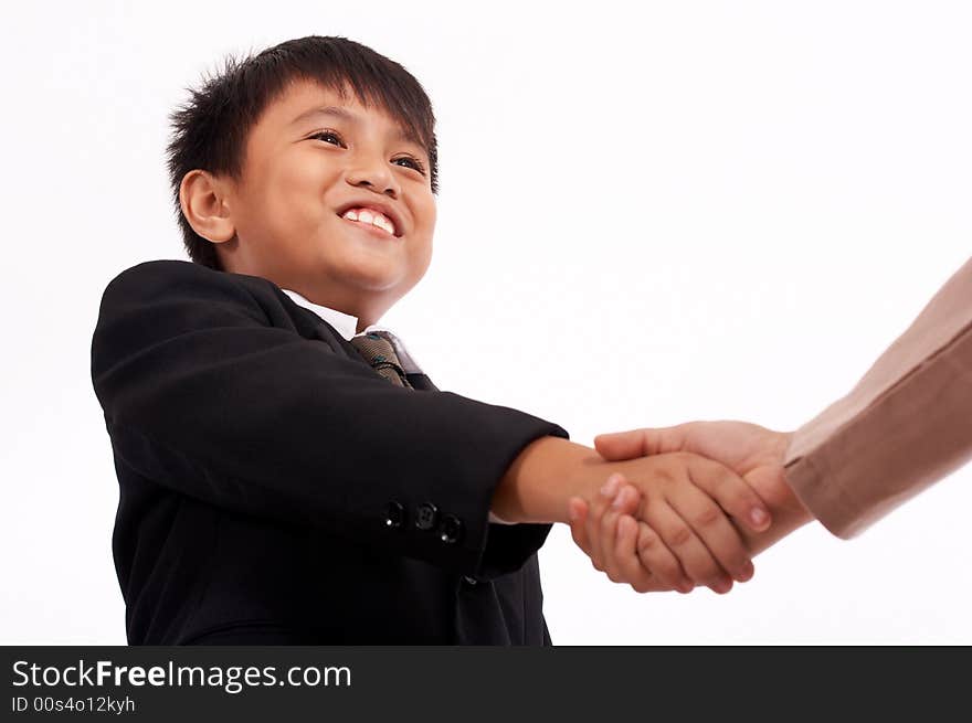 Smiling young boss shaking hands with the business partner