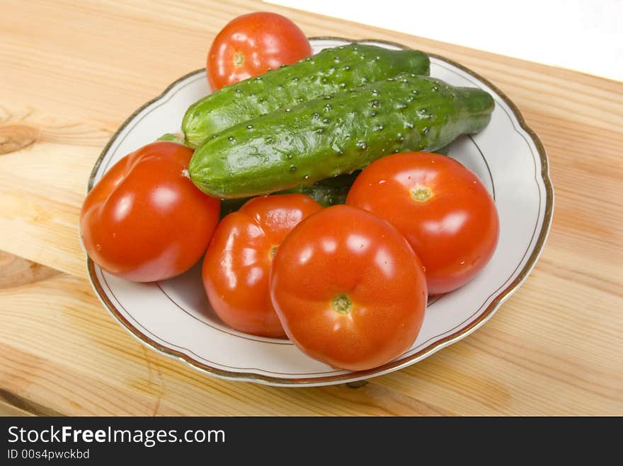 Tomatoes And Cucumbers On Blow